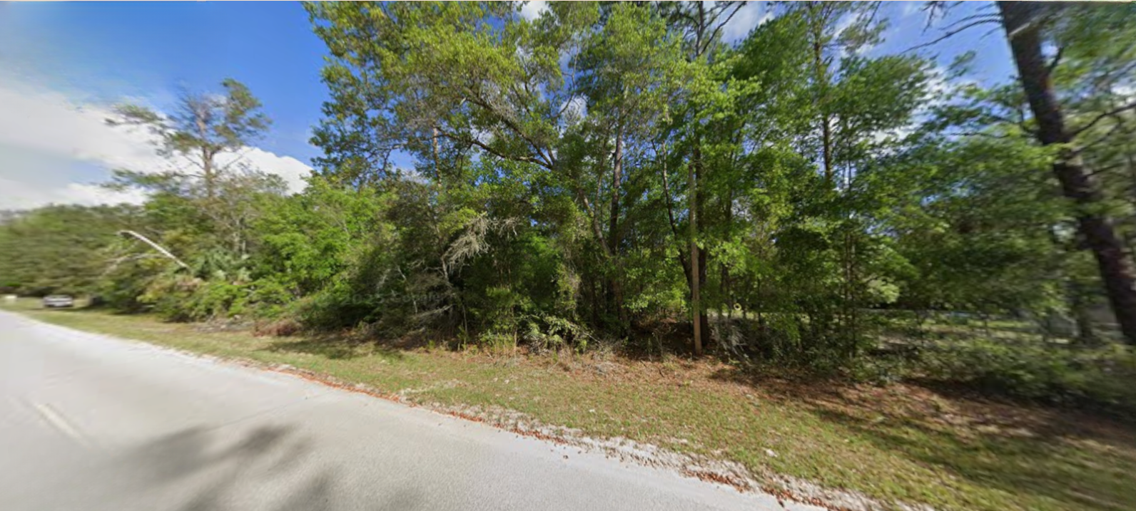 Build-Ready Florida Lot | Power Nearby, Road Access & Neighboring Homes (0260-0210)
